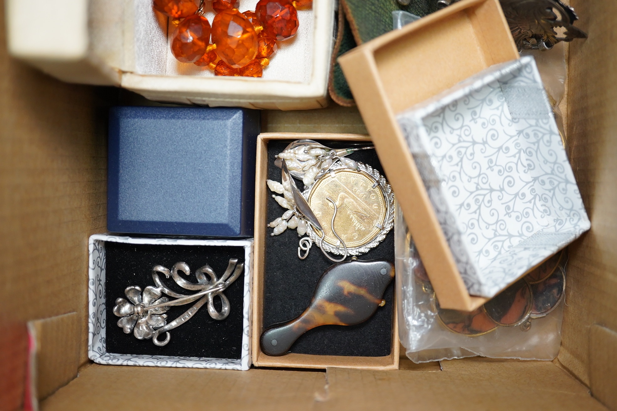 A silver plated ornate lady's belt, various items of costume jewellery, two beaded evening bags and a black jet mounted bag. Condition - varies